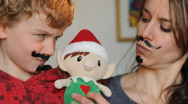 Christmas Elf Draws Moustache